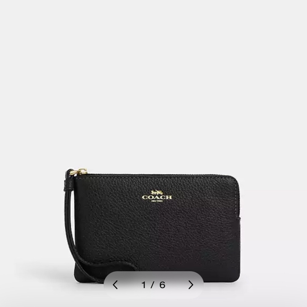 Coach Corner Zip Wristlet Style: CP483
Two credit card slots Zip-top closure
